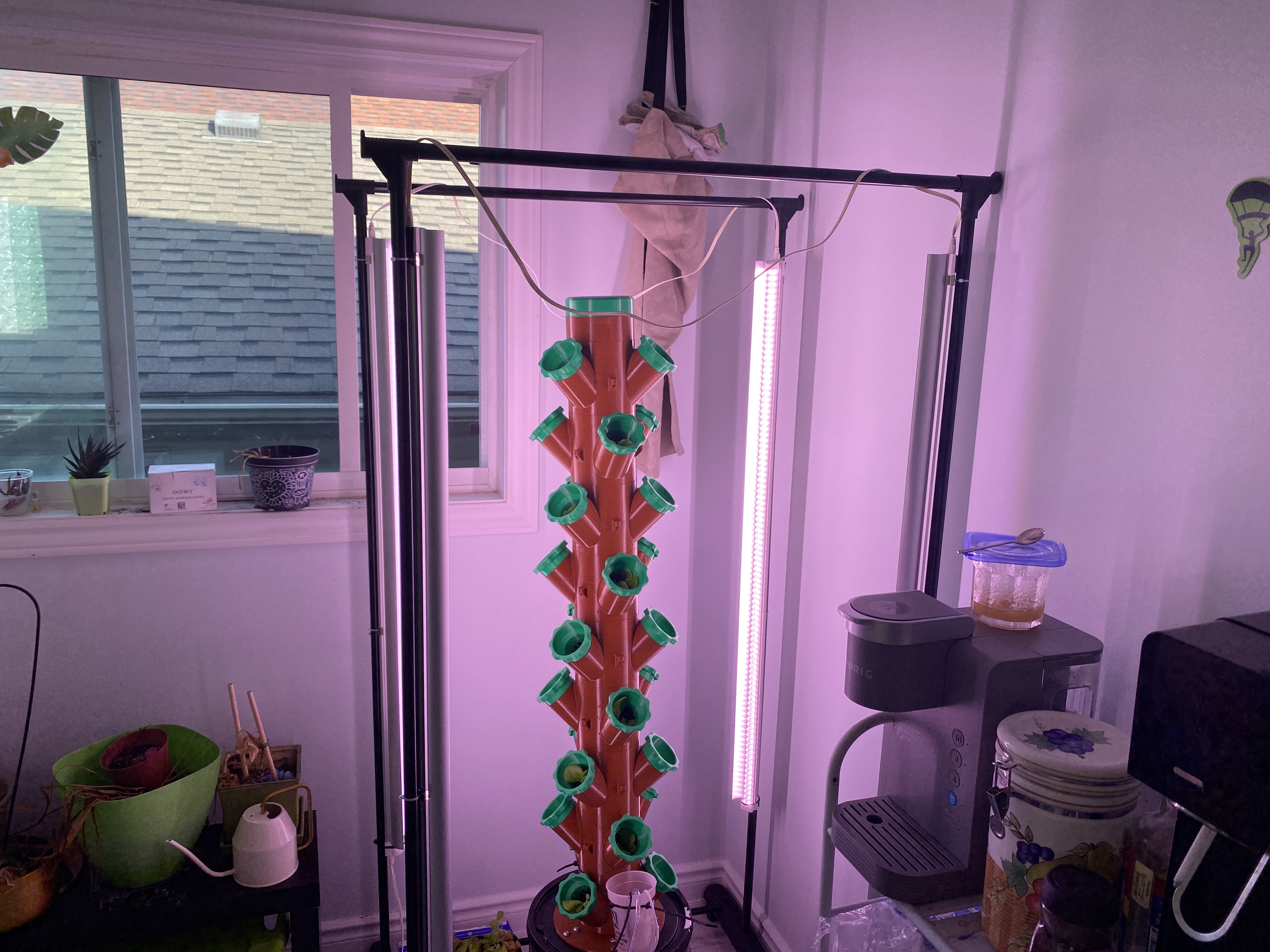 Indoor hydroponic tower garden with LED grow lights